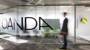 米裁判所がスイス当局に証言協力を要請。OANDAとGAINの特許侵害訴訟で、リチャード・オルセン博士の証言が重要となる。